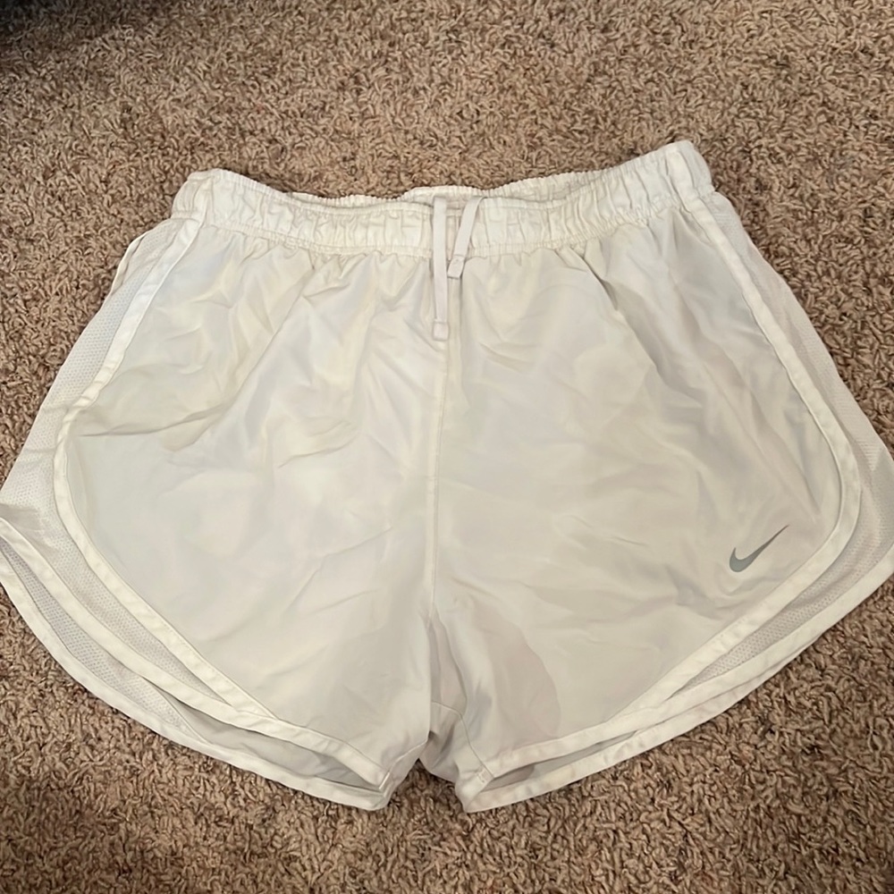 White Nike shorts.